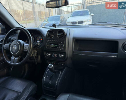 Чорний Джип Patriot, об'ємом двигуна 2.4 л та пробігом 128 тис. км за 10300 $, фото 12 на Automoto.ua