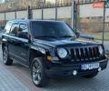 Чорний Джип Patriot, об'ємом двигуна 2.4 л та пробігом 128 тис. км за 10300 $, фото 1 на Automoto.ua