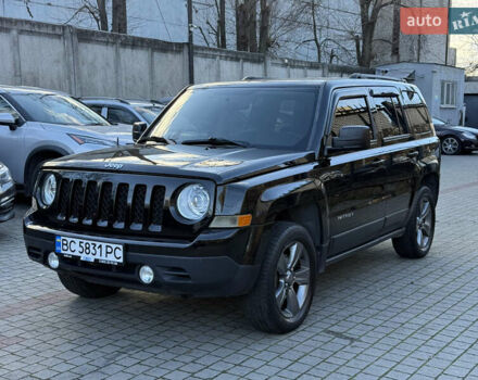 Чорний Джип Patriot, об'ємом двигуна 2.4 л та пробігом 128 тис. км за 10300 $, фото 2 на Automoto.ua