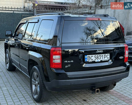 Чорний Джип Patriot, об'ємом двигуна 2.4 л та пробігом 128 тис. км за 10300 $, фото 4 на Automoto.ua