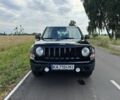 Черный Джип Патриот, объемом двигателя 2.4 л и пробегом 169 тыс. км за 11100 $, фото 2 на Automoto.ua