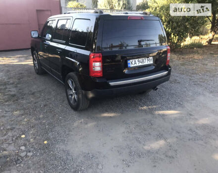 Черный Джип Патриот, объемом двигателя 2.36 л и пробегом 165 тыс. км за 13000 $, фото 4 на Automoto.ua