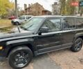 Чорний Джип Patriot, об'ємом двигуна 2.36 л та пробігом 188 тис. км за 12500 $, фото 1 на Automoto.ua