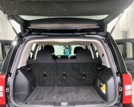 Черный Джип Патриот, объемом двигателя 2.36 л и пробегом 244 тыс. км за 10000 $, фото 1 на Automoto.ua