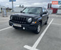 Черный Джип Патриот, объемом двигателя 2.36 л и пробегом 143 тыс. км за 10900 $, фото 1 на Automoto.ua