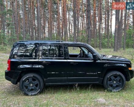 Чорний Джип Patriot, об'ємом двигуна 2.36 л та пробігом 244 тис. км за 10000 $, фото 4 на Automoto.ua