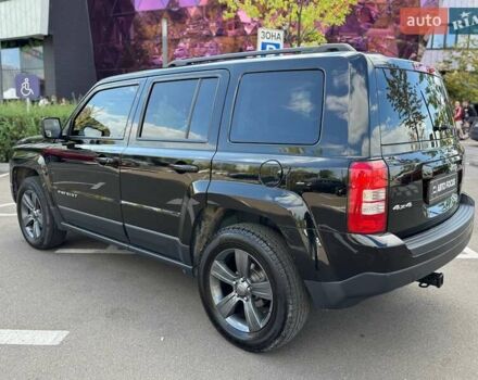 Чорний Джип Patriot, об'ємом двигуна 2.36 л та пробігом 123 тис. км за 10690 $, фото 4 на Automoto.ua