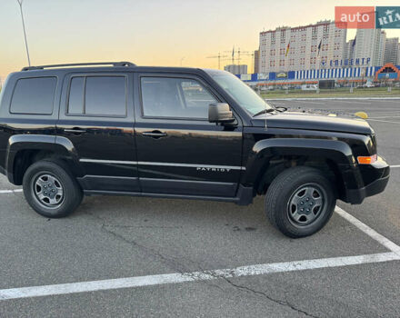 Чорний Джип Patriot, об'ємом двигуна 2.36 л та пробігом 187 тис. км за 10900 $, фото 4 на Automoto.ua