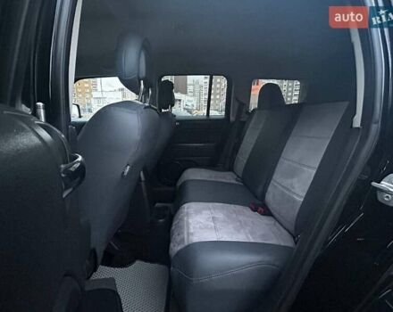Чорний Джип Patriot, об'ємом двигуна 2.36 л та пробігом 145 тис. км за 10990 $, фото 10 на Automoto.ua