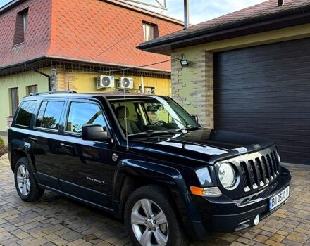 Черный Джип Патриот, объемом двигателя 2.4 л и пробегом 187 тыс. км за 9200 $, фото 1 на Automoto.ua