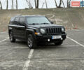 Черный Джип Патриот, объемом двигателя 2 л и пробегом 137 тыс. км за 10350 $, фото 2 на Automoto.ua