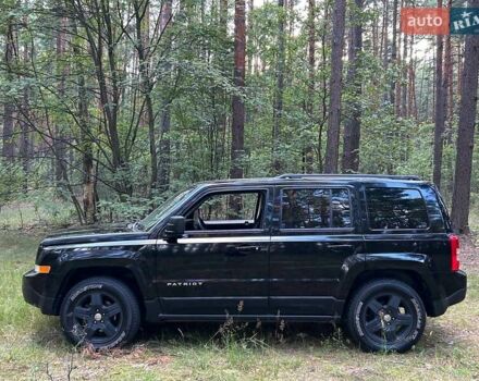 Чорний Джип Patriot, об'ємом двигуна 2.36 л та пробігом 244 тис. км за 10000 $, фото 5 на Automoto.ua