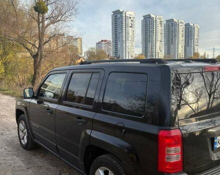 Черный Джип Патриот, объемом двигателя 2.36 л и пробегом 144 тыс. км за 10500 $, фото 6 на Automoto.ua