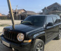 Черный Джип Патриот, объемом двигателя 2.4 л и пробегом 200 тыс. км за 12000 $, фото 1 на Automoto.ua