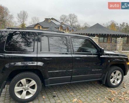 Черный Джип Патриот, объемом двигателя 2.4 л и пробегом 88 тыс. км за 10000 $, фото 3 на Automoto.ua