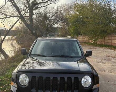 Черный Джип Патриот, объемом двигателя 2.36 л и пробегом 144 тыс. км за 10500 $, фото 3 на Automoto.ua