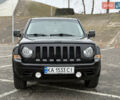 Черный Джип Патриот, объемом двигателя 2 л и пробегом 137 тыс. км за 10350 $, фото 1 на Automoto.ua