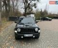 Черный Джип Патриот, объемом двигателя 2.4 л и пробегом 88 тыс. км за 10000 $, фото 1 на Automoto.ua