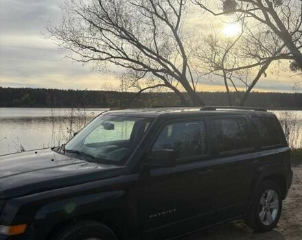 Черный Джип Патриот, объемом двигателя 2.36 л и пробегом 144 тыс. км за 10500 $, фото 4 на Automoto.ua