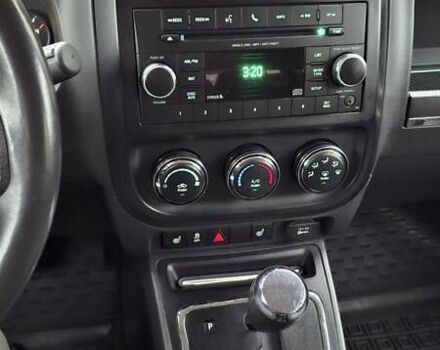 Черный Джип Патриот, объемом двигателя 2.36 л и пробегом 187 тыс. км за 10800 $, фото 3 на Automoto.ua