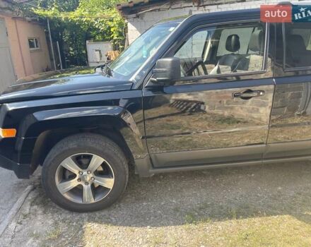 Черный Джип Патриот, объемом двигателя 2.36 л и пробегом 157 тыс. км за 11300 $, фото 3 на Automoto.ua