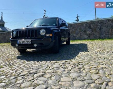 Черный Джип Патриот, объемом двигателя 2.36 л и пробегом 210 тыс. км за 8400 $, фото 4 на Automoto.ua
