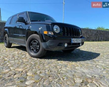 Черный Джип Патриот, объемом двигателя 2.36 л и пробегом 210 тыс. км за 8400 $, фото 2 на Automoto.ua