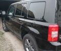 Чорний Джип Patriot, об'ємом двигуна 2.36 л та пробігом 63 тис. км за 12000 $, фото 3 на Automoto.ua