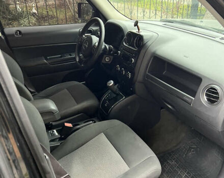 Черный Джип Патриот, объемом двигателя 2.36 л и пробегом 167 тыс. км за 10200 $, фото 4 на Automoto.ua