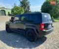 Черный Джип Патриот, объемом двигателя 2.36 л и пробегом 210 тыс. км за 8400 $, фото 5 на Automoto.ua