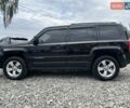 Чорний Джип Patriot, об'ємом двигуна 2.36 л та пробігом 224 тис. км за 11900 $, фото 2 на Automoto.ua