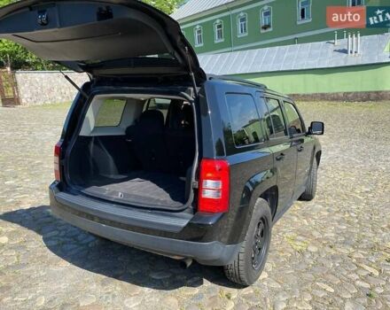 Черный Джип Патриот, объемом двигателя 2.36 л и пробегом 210 тыс. км за 8400 $, фото 8 на Automoto.ua