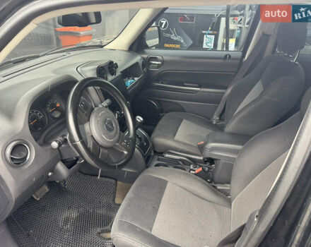 Черный Джип Патриот, объемом двигателя 2.4 л и пробегом 146 тыс. км за 11000 $, фото 11 на Automoto.ua