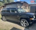 Черный Джип Патриот, объемом двигателя 2.36 л и пробегом 157 тыс. км за 11300 $, фото 1 на Automoto.ua