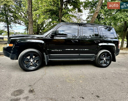 Черный Джип Патриот, объемом двигателя 2.4 л и пробегом 146 тыс. км за 11000 $, фото 1 на Automoto.ua