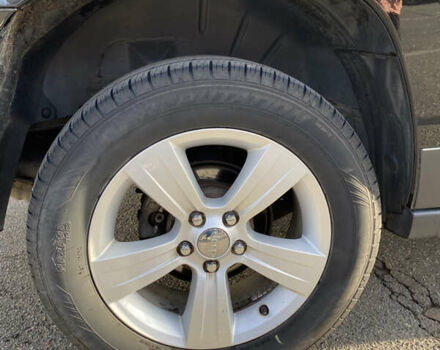 Черный Джип Патриот, объемом двигателя 2.36 л и пробегом 99 тыс. км за 11500 $, фото 3 на Automoto.ua