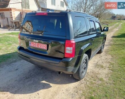 Черный Джип Патриот, объемом двигателя 2.4 л и пробегом 118 тыс. км за 11200 $, фото 7 на Automoto.ua