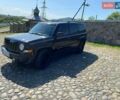Черный Джип Патриот, объемом двигателя 2.36 л и пробегом 210 тыс. км за 8400 $, фото 1 на Automoto.ua