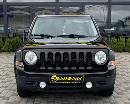 Черный Джип Патриот, объемом двигателя 2.4 л и пробегом 200 тыс. км за 9800 $, фото 1 на Automoto.ua
