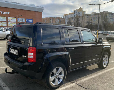 Черный Джип Патриот, объемом двигателя 2.36 л и пробегом 99 тыс. км за 11500 $, фото 2 на Automoto.ua