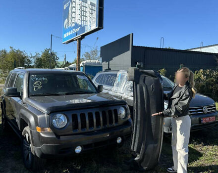 Черный Джип Патриот, объемом двигателя 2.4 л и пробегом 155 тыс. км за 9200 $, фото 1 на Automoto.ua