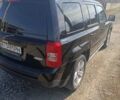 Чорний Джип Patriot, об'ємом двигуна 2 л та пробігом 180 тис. км за 11900 $, фото 13 на Automoto.ua