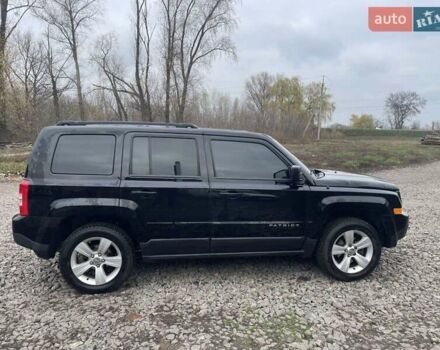 Черный Джип Патриот, объемом двигателя 2.36 л и пробегом 192 тыс. км за 10900 $, фото 6 на Automoto.ua