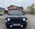 Черный Джип Патриот, объемом двигателя 2.4 л и пробегом 200 тыс. км за 10000 $, фото 1 на Automoto.ua