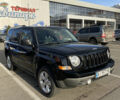 Черный Джип Патриот, объемом двигателя 2.36 л и пробегом 99 тыс. км за 11500 $, фото 1 на Automoto.ua