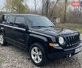 Черный Джип Патриот, объемом двигателя 2.36 л и пробегом 192 тыс. км за 10900 $, фото 1 на Automoto.ua