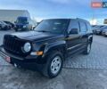 Чорний Джип Patriot, об'ємом двигуна 2.4 л та пробігом 267 тис. км за 10490 $, фото 1 на Automoto.ua