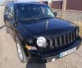 Чорний Джип Patriot, об'ємом двигуна 2 л та пробігом 180 тис. км за 11900 $, фото 1 на Automoto.ua