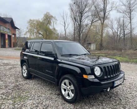 Черный Джип Патриот, объемом двигателя 2.4 л и пробегом 200 тыс. км за 10000 $, фото 1 на Automoto.ua