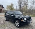 Черный Джип Патриот, объемом двигателя 2.4 л и пробегом 200 тыс. км за 10000 $, фото 1 на Automoto.ua